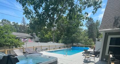 Spacious 5 bedroom home with private pool, hot tub & 10 minute walk to the beach