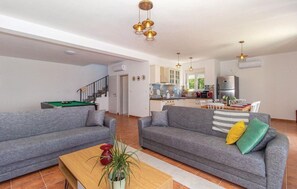 House | Living room | 30-inch TV with digital channels