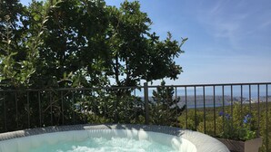 A hot tub with a view of a bridge and a body of water. - Holiday Home-big Swimming Pool-amazing Views (Kraljevica)