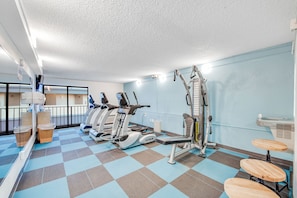 Stay active with our fully equipped gym featuring treadmills, stationary bikes, and a rowing machine.