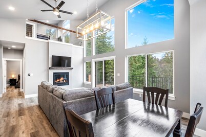 Secluded home with deck, grill, hot tub, fireplace, private beach, & W/D