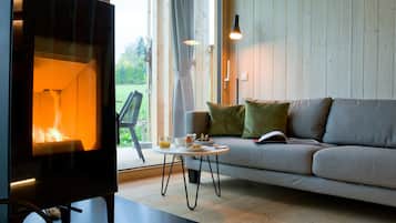 Romantic Chalet | Living area | 43-inch Smart TV with satellite channels, TV, tablet