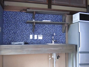 Executive Studio Suite, Non Smoking | Private kitchen | Fridge, microwave