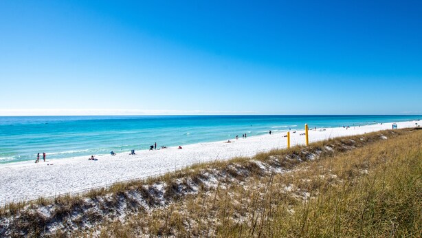 A beach with white sand and clear blue water. - Summer Breeze 312 1 Bedroom Condo by RedAwning (Miramar Beach)