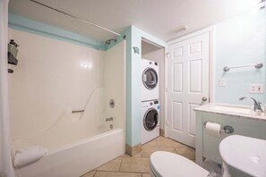 Bathtub, hair dryer, towels