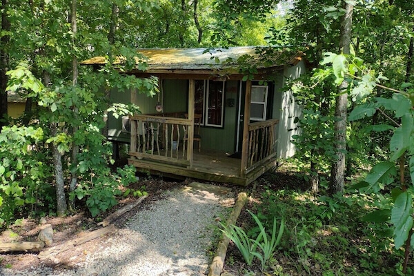 EXTERIOR:  The front of the cabin in the summer.  (Note the "hillbilly-chic" styling. ;-)