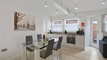 Apartment, 2 Bedrooms | Living area | Flat-screen TV