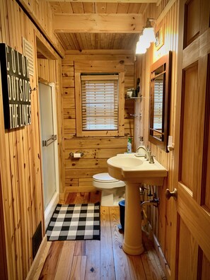 Bathtub, hair dryer, towels, soap
