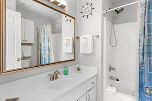 Bathtub, hair dryer, towels