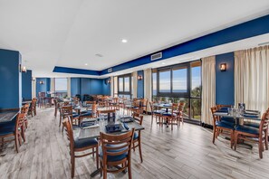 Enjoy meals in this stylish dining area with a view of the outdoors.