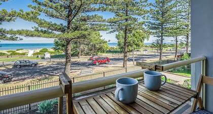 Beachfront self contained upstairs apartment