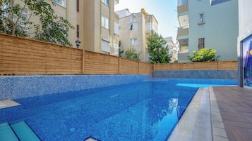 2 outdoor pools, open 8:00 AM to 7:00 PM, pool umbrellas, sun loungers