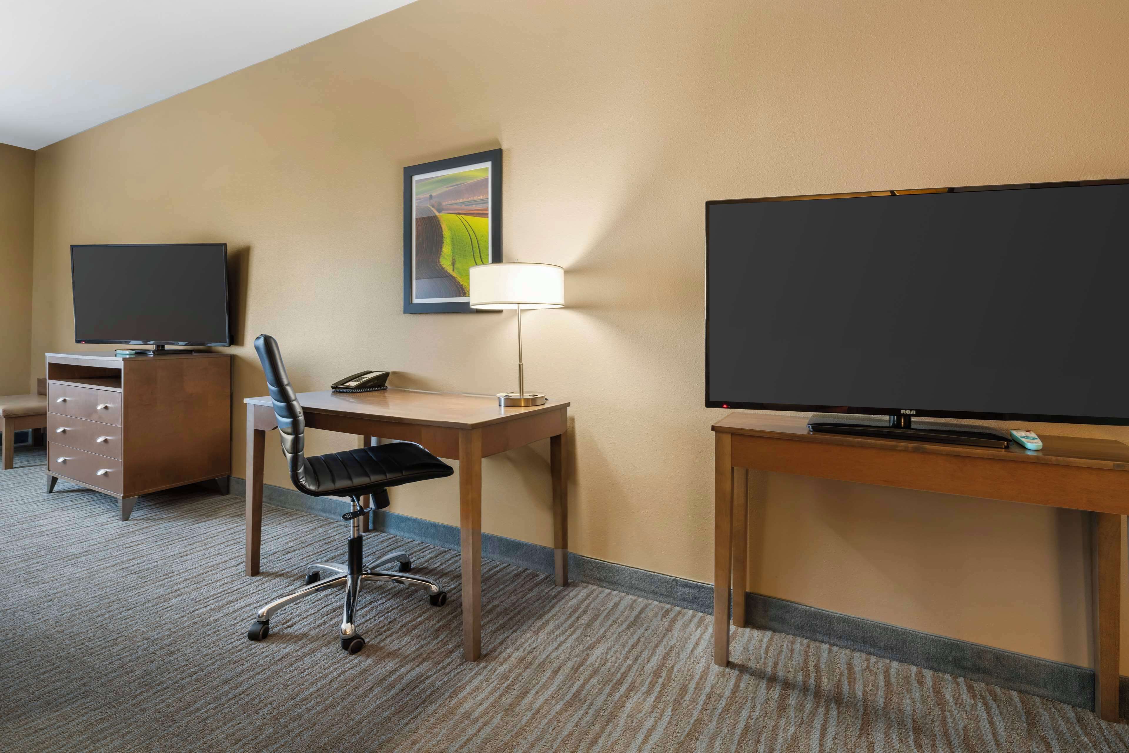 suite, 2 queen beds, non smoking, refrigerator & microwave (with sofabed) | 1 bedroom, desk, laptop workspace, iron/ironing board