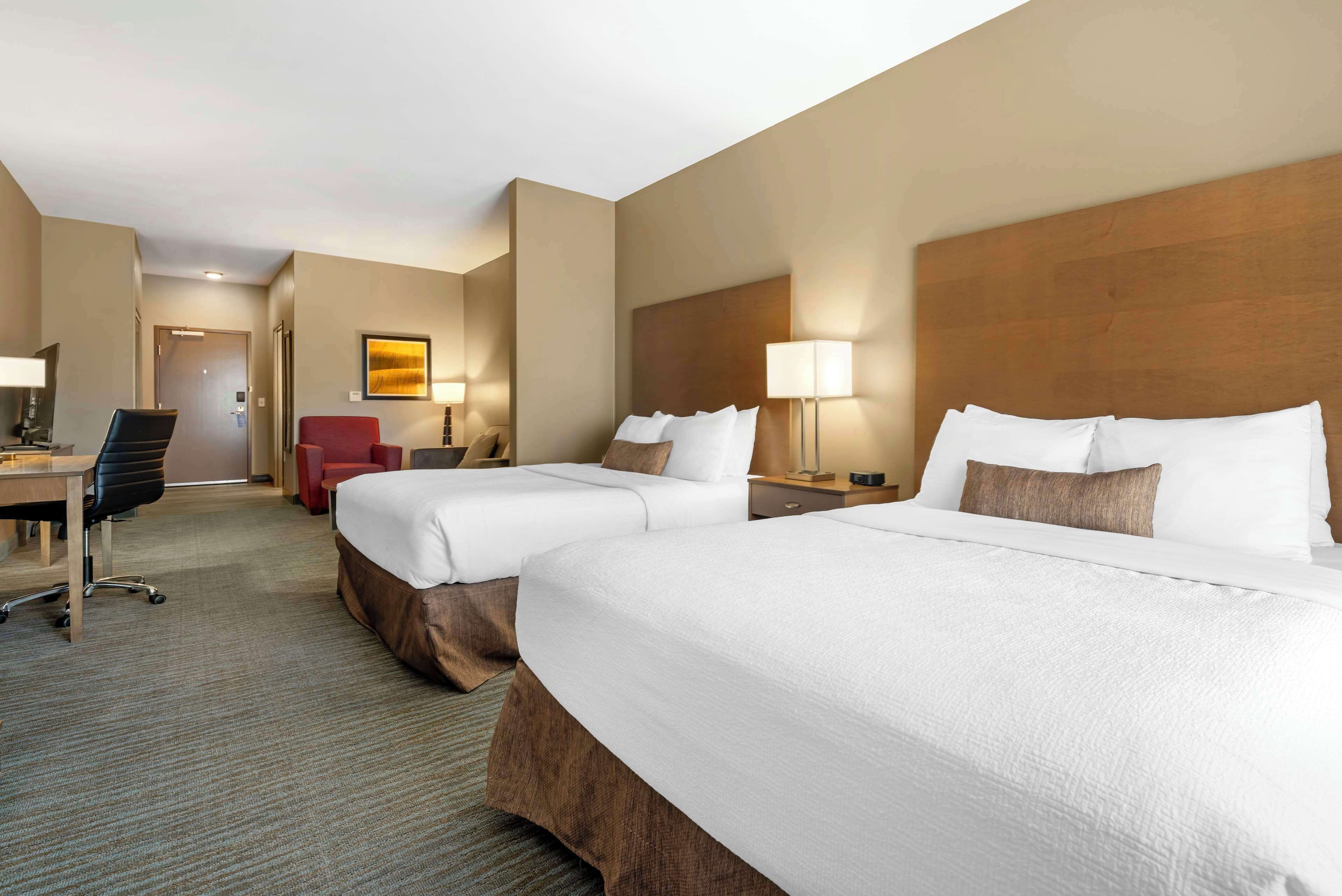 suite, 2 queen beds, non smoking, refrigerator & microwave (with sofabed) | 1 bedroom, desk, laptop workspace, iron/ironing board