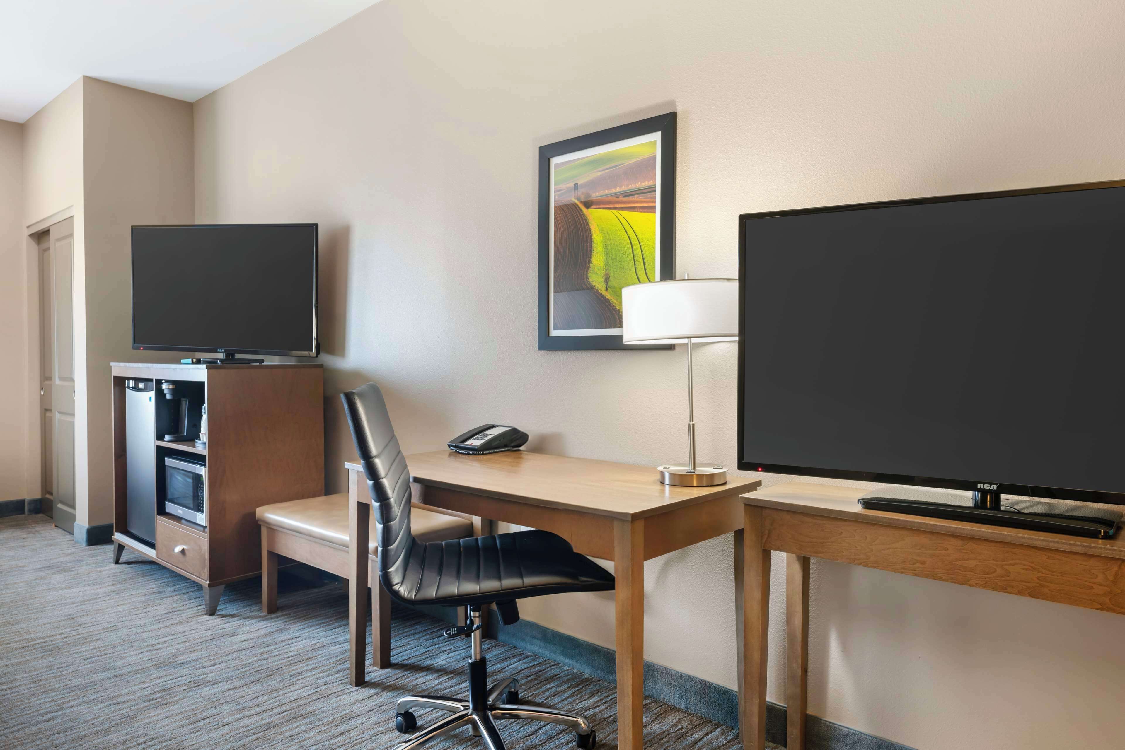 suite, 2 queen beds, accessible, refrigerator & microwave (with sofabed) | 1 bedroom, desk, laptop workspace, iron/ironing board