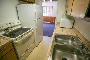 Condo, 2 Bedrooms | Private kitchen | Fridge, oven, coffee/tea maker, toaster