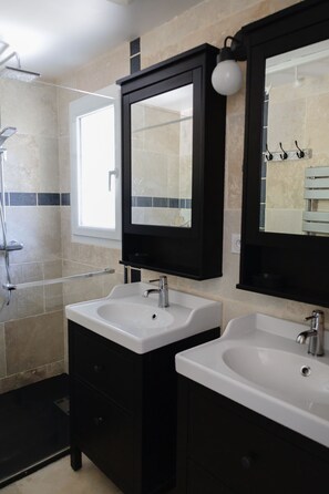 Shower, hair dryer, towels, soap