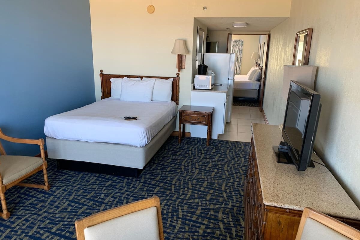 Chambre Familiale, plusieurs lits, balcon | 1 chambre, bureau, fer et planche à repasser, Wi-Fi gratuit