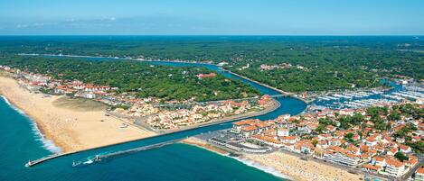 On the beach, sun-loungers