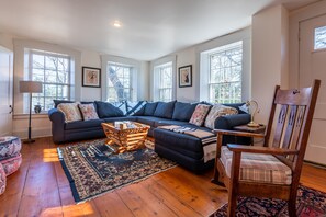 Smart TV, fireplace, table football, books