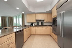 Coffee/tea maker, fridge, microwave, oven