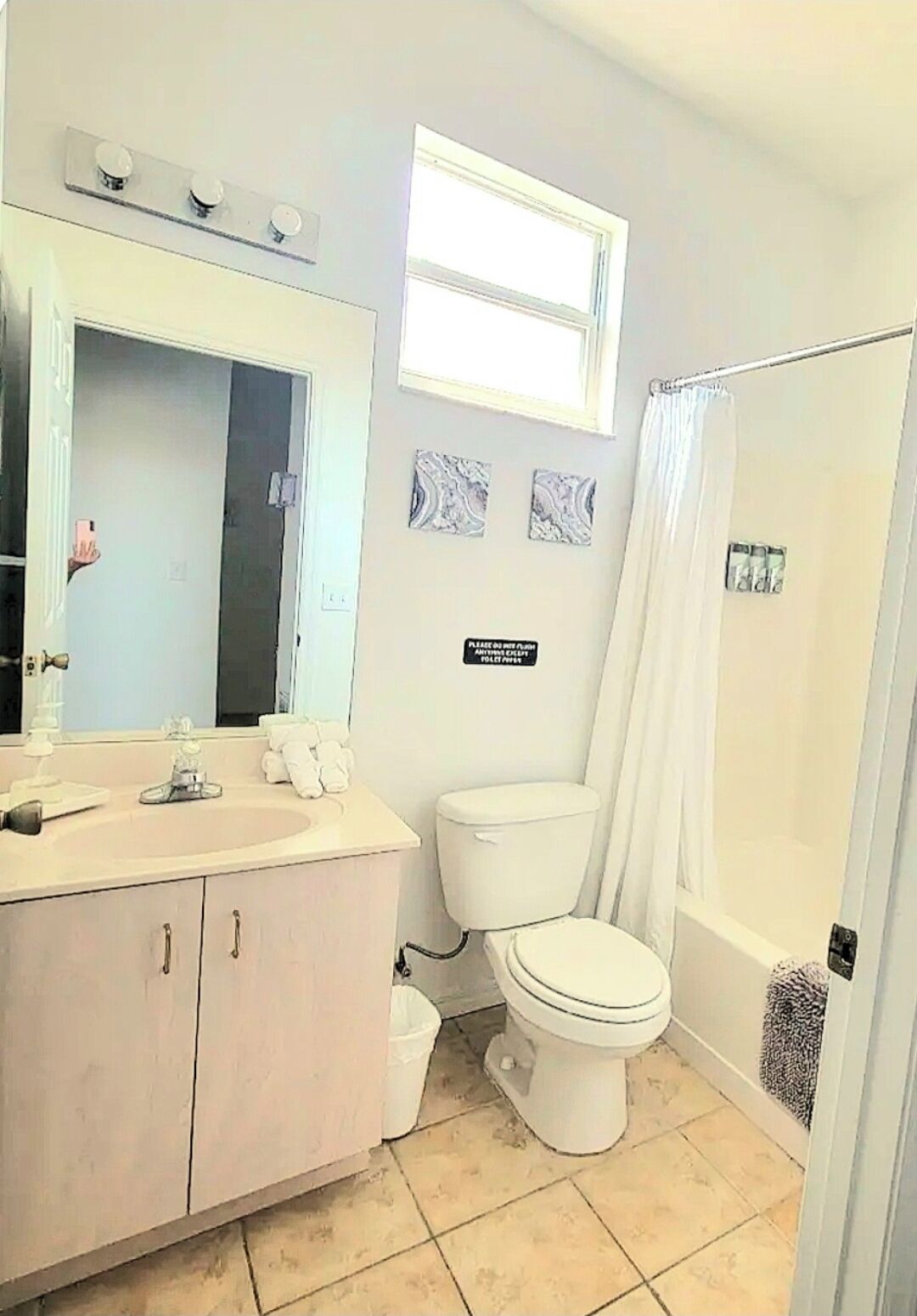 Combined shower/bathtub, hair dryer, towels, soap