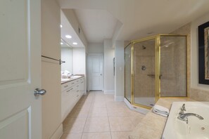 Combined shower/bathtub, jetted bath, hair dryer, towels - Elegant Newly Remodeled Three Bedroom with Bay Views! Complimentary Boat Slip! (Orange Beach)