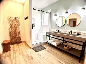 Combined shower/tub, hair dryer, towels, soap