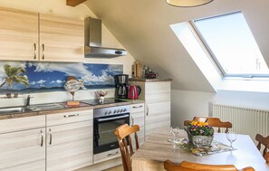 Fridge, stovetop, coffee/tea maker