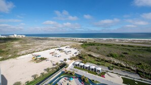 A resort with a pool, beach access, and ocean views. - Timeless Three Bedroom Penthouse with Gulf of Mexico Views (Orange Beach)