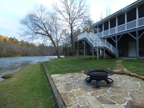 Winter in the mountains, fishing by the fire pit. Murphy and the Casino nearby.