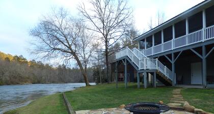 Winter in the mountains, fishing by the fire pit. Murphy and the Casino nearby.