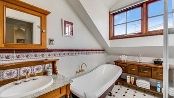 Bathtub, hair dryer, towels, soap