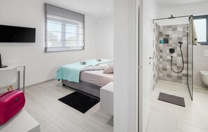 4 Schlafzimmer, Zimmersafe, Reisekinderbett, kostenloses WLAN