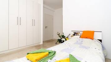 Villa (Four Bedroom Apartment - Balconies an) | 4 bedrooms, cots/infant beds