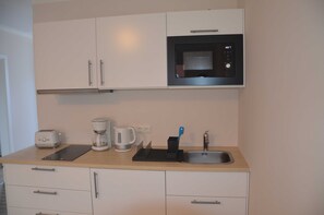 Fridge, microwave, coffee/tea maker, electric kettle