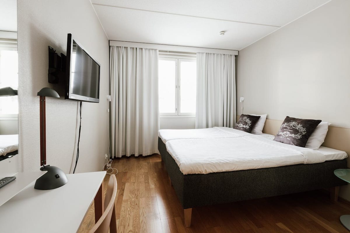 2 slaapkamers, hypoallergeen beddengoed, een minibar, een bureau