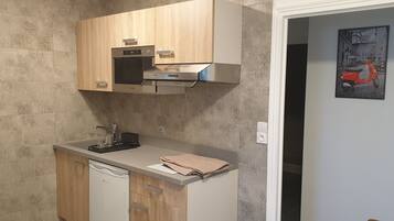 Fridge, stovetop, electric kettle, toaster