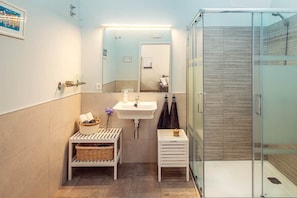 Hair dryer, towels, soap, shampoo