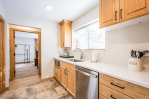 Fridge, microwave, dishwasher, coffee/tea maker