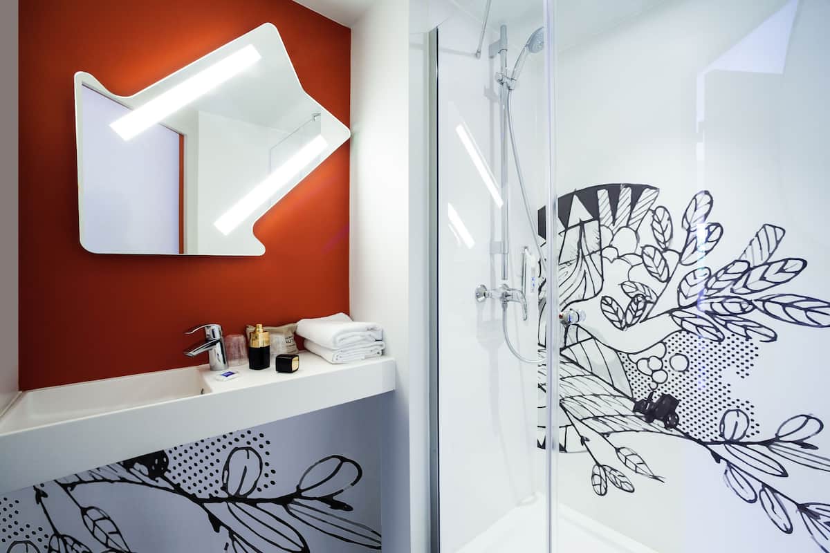 room, multiple beds | bathroom | shower, eco-friendly toiletries, towels