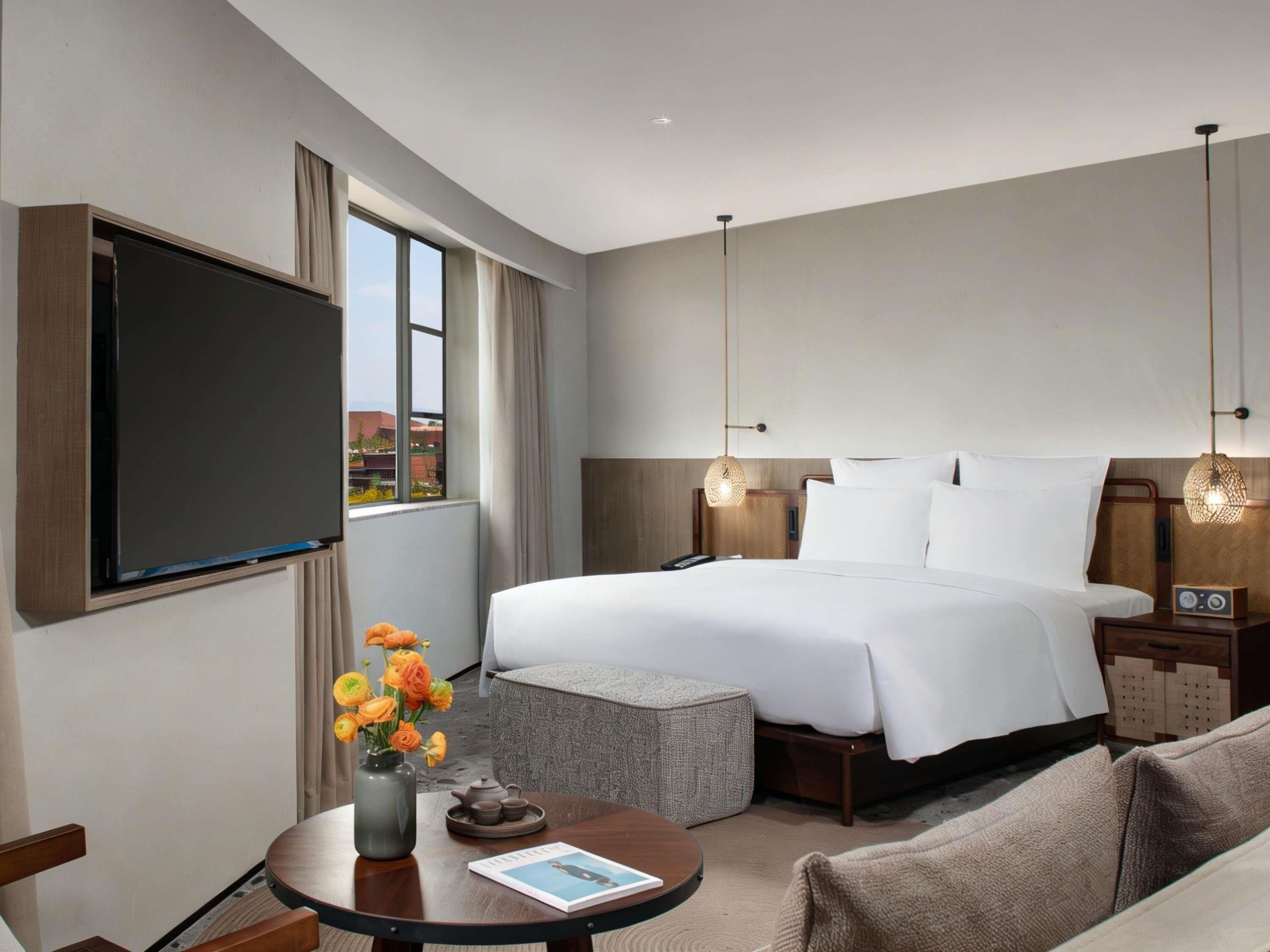 Premium bedding, down comforters, pillowtop beds, minibar