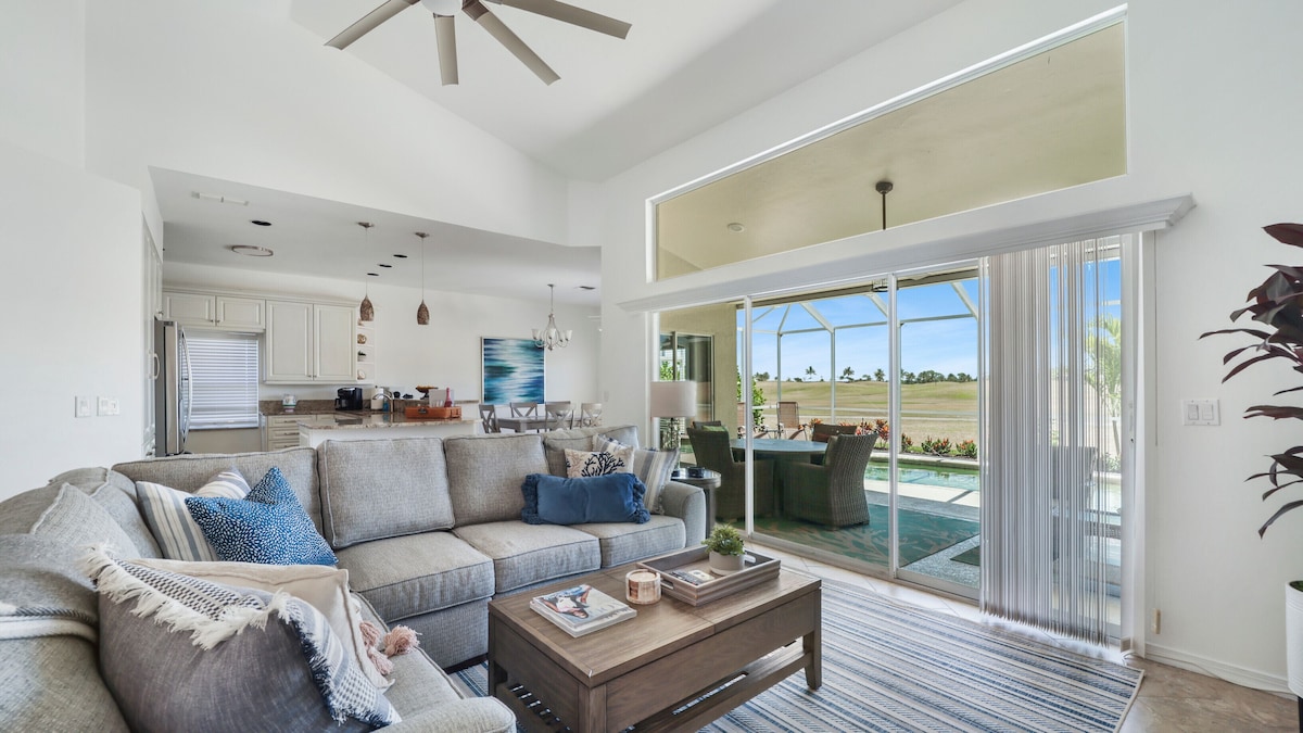 Enjoy Players Club Access in this Luxurious Naples Golf Course Home.