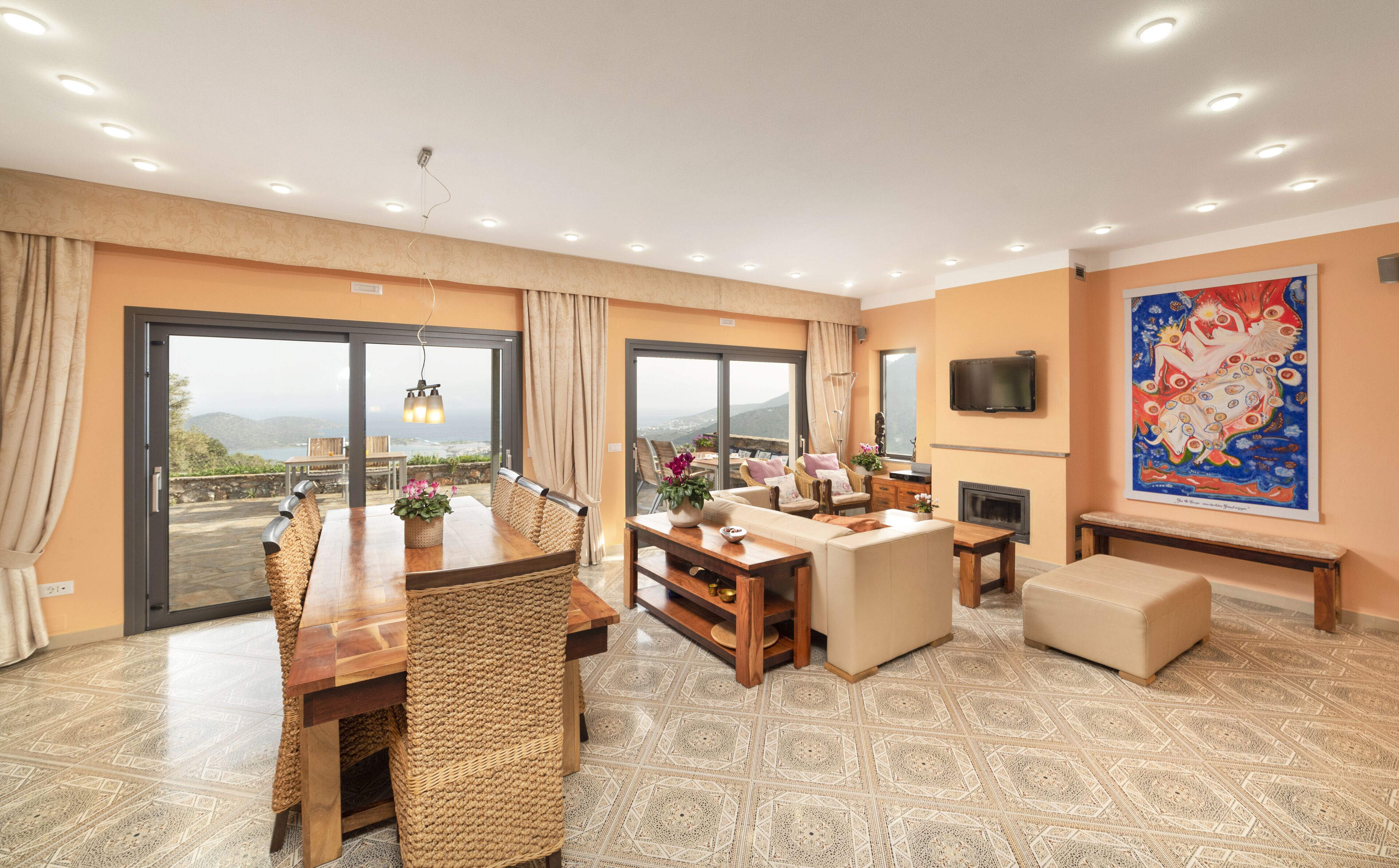 Smart-tv, eldstad, dvd-spelare och böcker