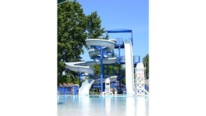 A water park with multiple water slides and a clear blue sky. - Dexter Victorian Homestead- Brand NEW Remodel April 2026. VERY Clean & Cozy (Dexter)