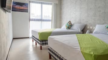 Suite estudio ejecutiva, 2 camas de matrimonio | Decoración individual, mobiliario individual, wifi gratis y ropa de cama
