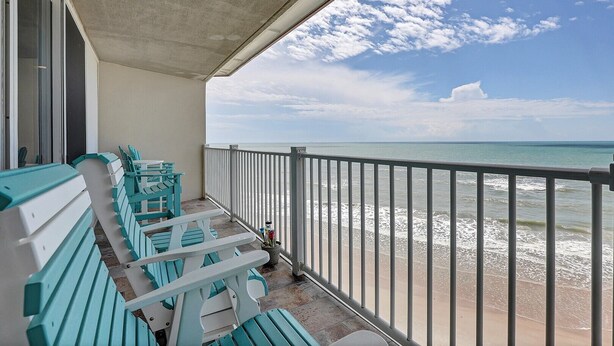 A balcony with turquoise benches overlooking a beach. - Top floor, oceanfront views! (North Topsail Beach)