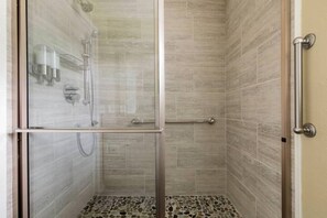 Bathtub, hair dryer, towels, soap