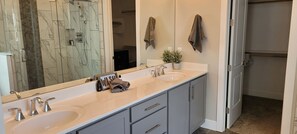 Combined shower/tub, hair dryer, towels, soap