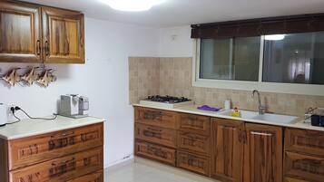 Fridge, microwave, coffee/tea maker, electric kettle